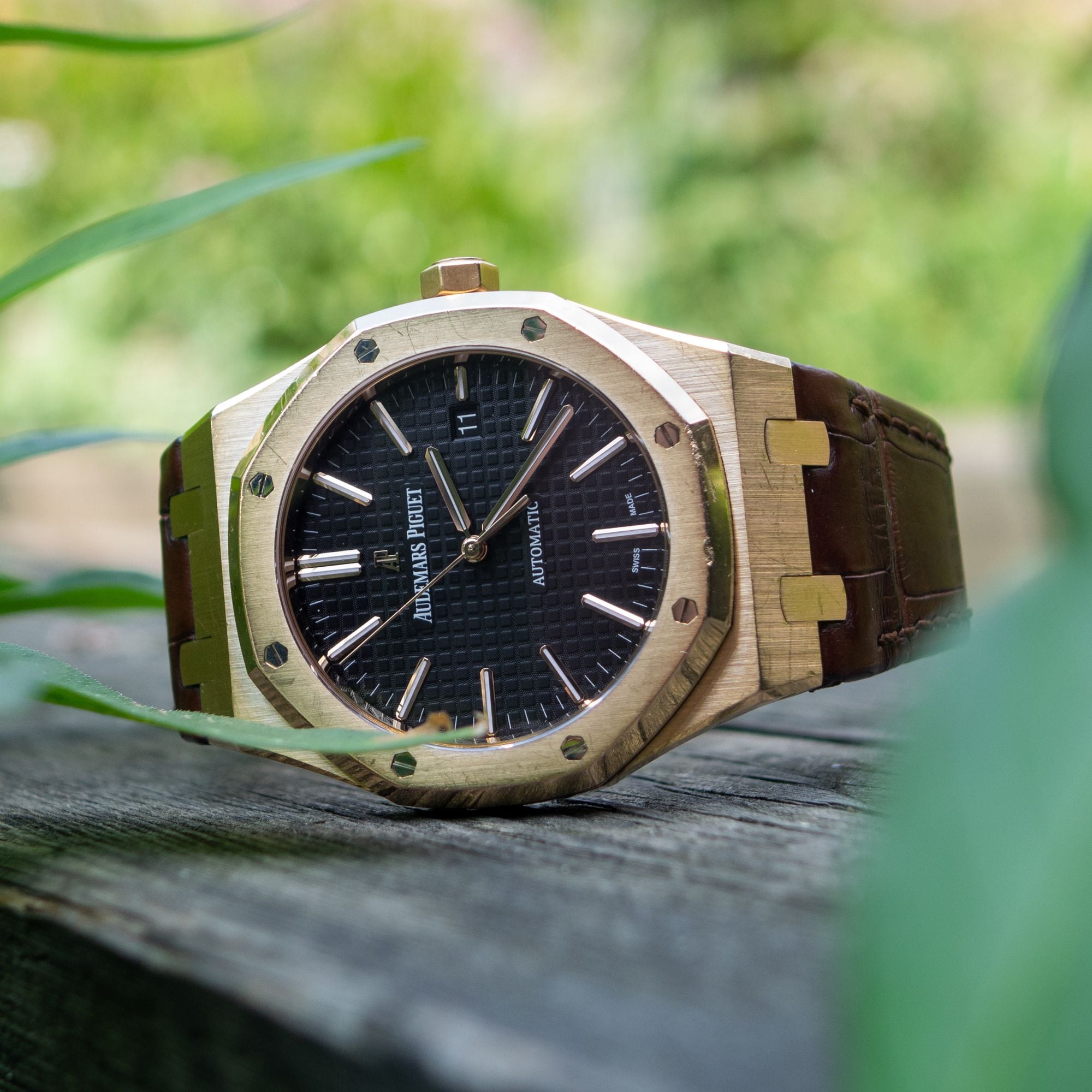 Audemars Piguet Royal Oak 15500 in pink gold with black Tapisserie dial on a brown strap