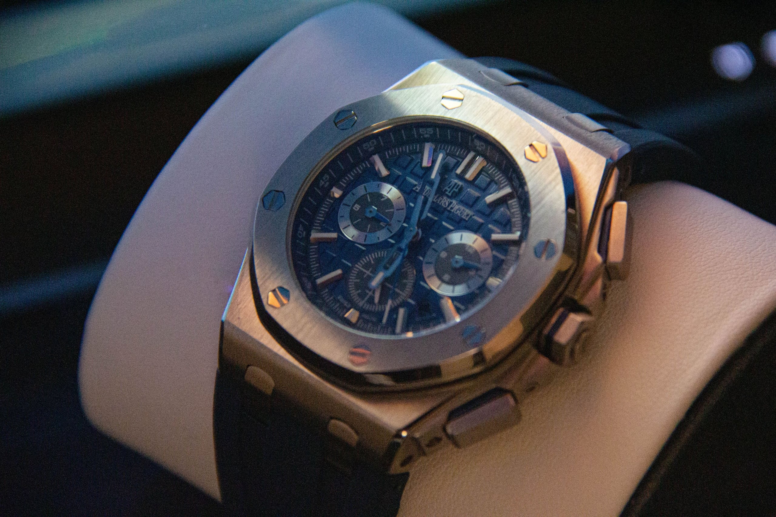 Audemars Piguet Royal Oak Offshore chronograph in pink gold with blue dial on a watch cushion