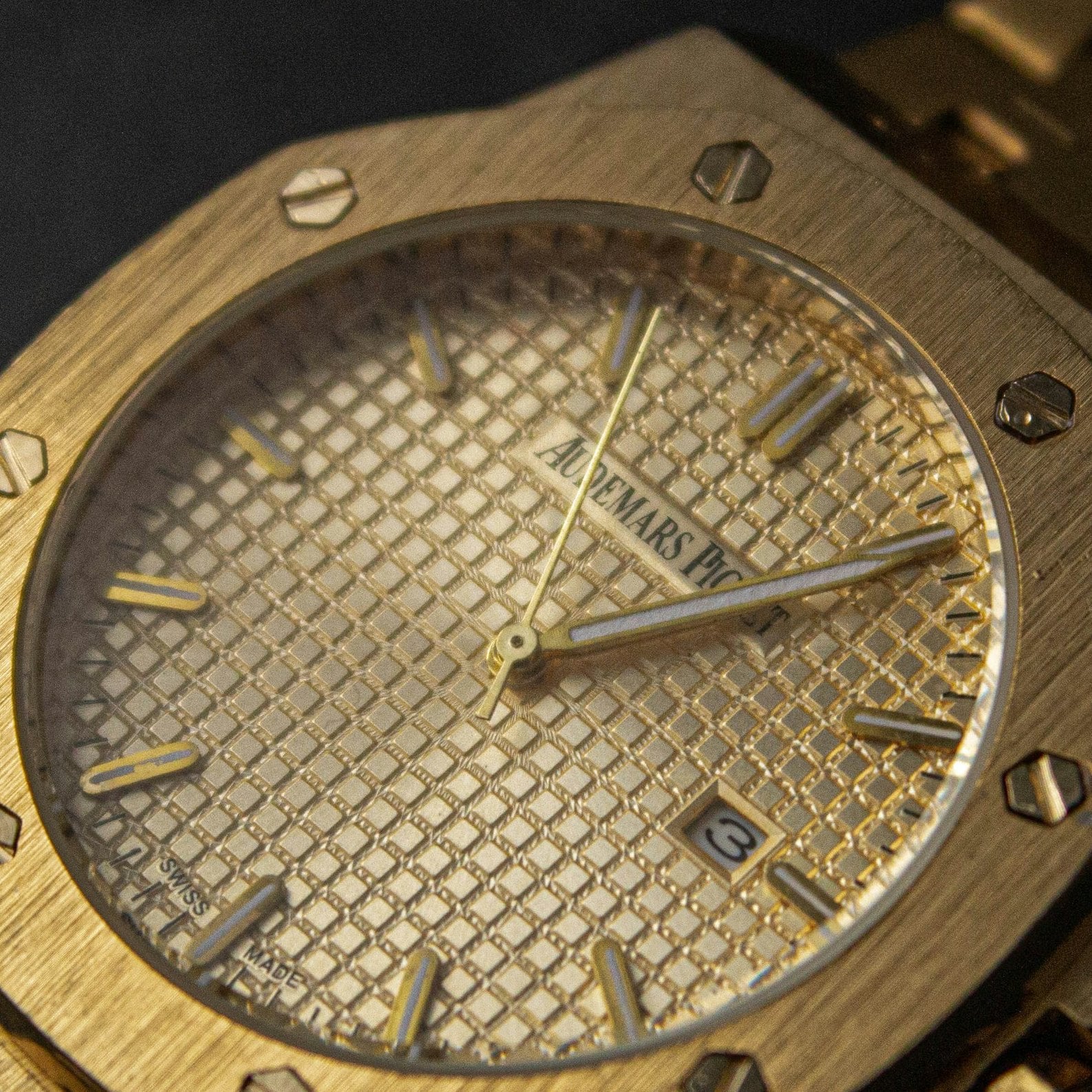 Close-up of the gold grande tapisserie dial of the Audemars Piguet Royal Oak Selfwinding 15400BA