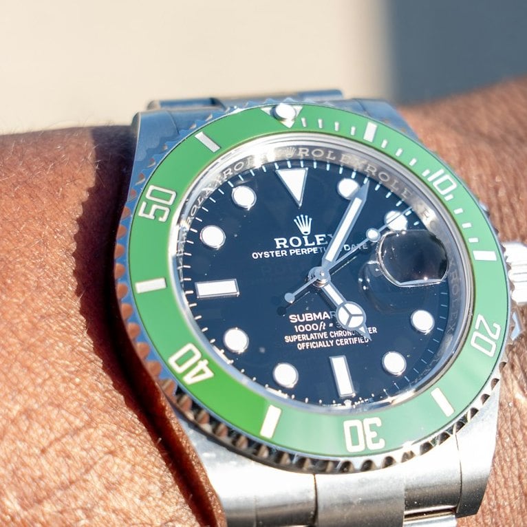 Close-up of the black dial of the Rolex Submariner Date 126610LV