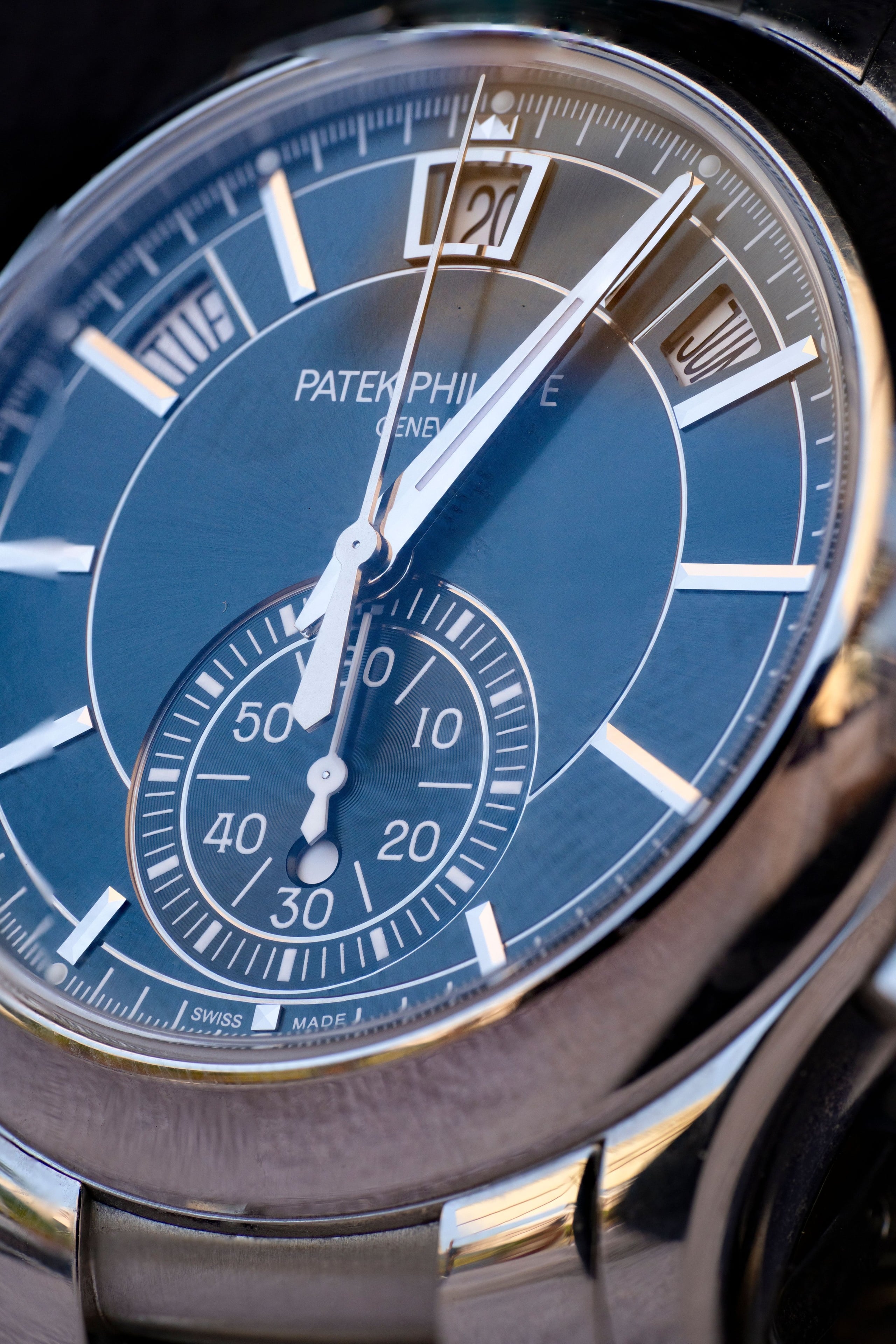 Close-up of a Patek Philippe 5905 annual calendar chronograph with blue sunburst dial